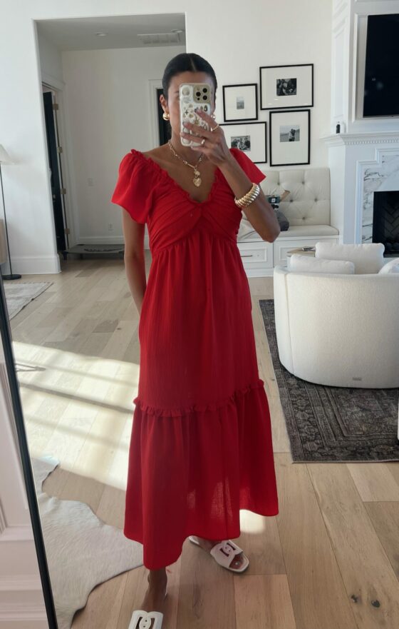 Christine Andrew in a red dress from walmart